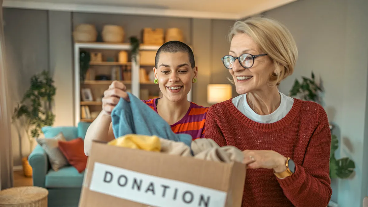 Two adults decluttering